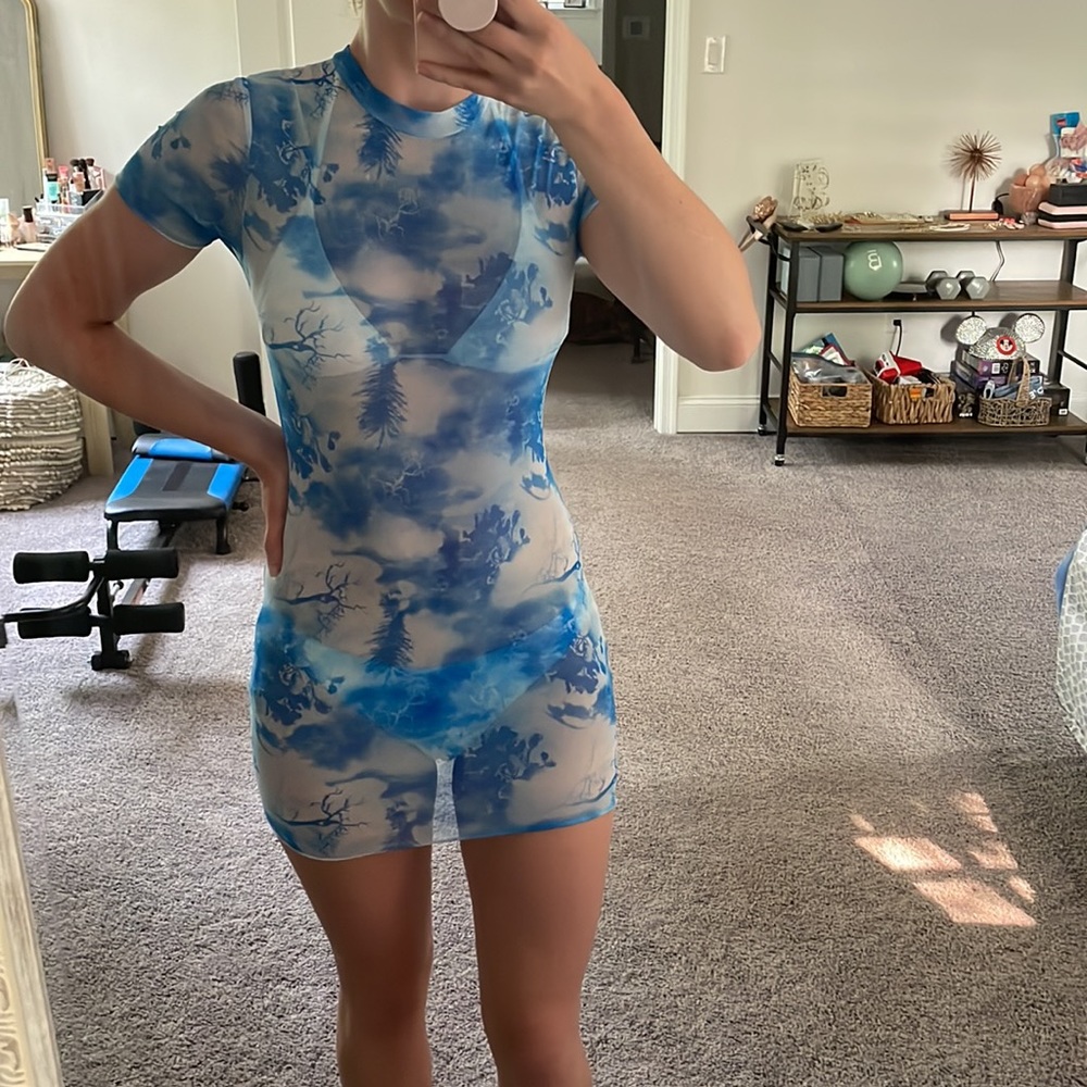 Three piece bikini set size small. Blue pattern with white top. Never worn